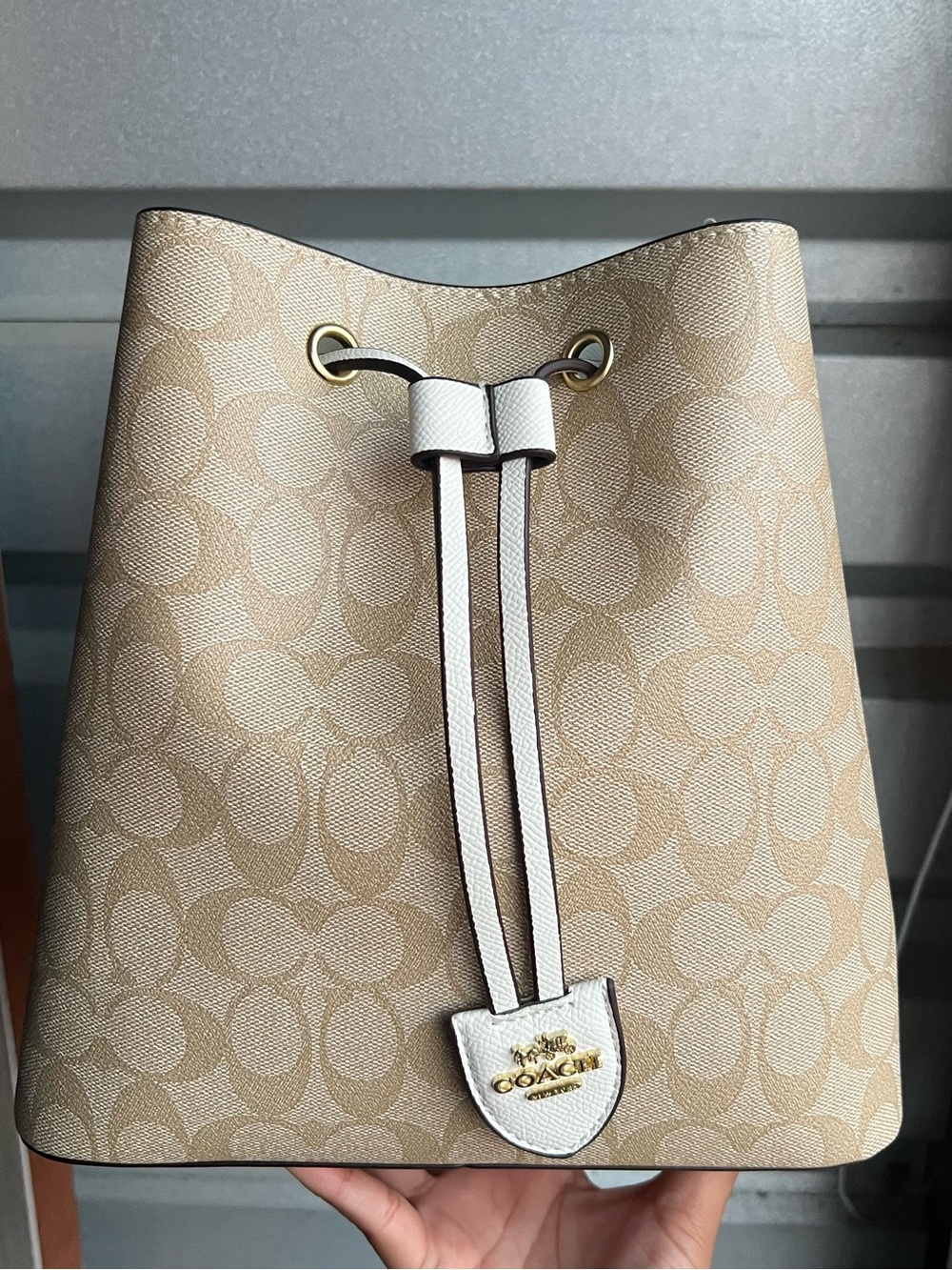 Coach Beige and White Signature Canvas Drawstring Bucket Bag